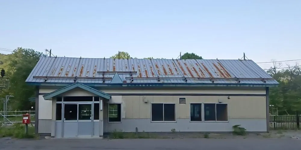 The meeting point for the canyoning tour at the historic Former Kanayama Station building.