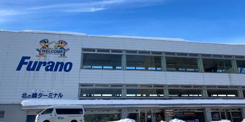 Skis and snowboards ready for rental.